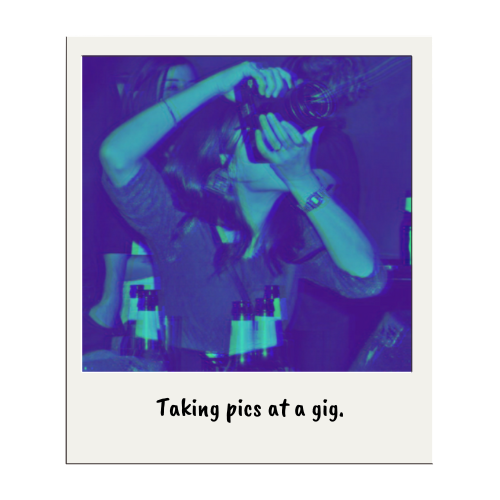 Me, holding a camera and making pics