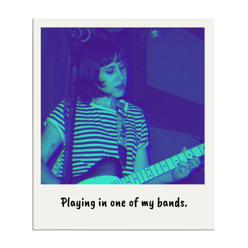 Me, playing a guitar